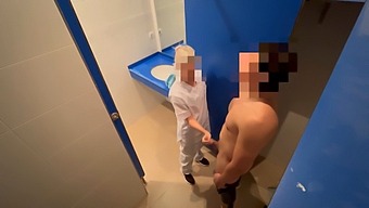 A Gym Cleaning Woman Helps Finish Off A Man Jerking Off In The Bathroom